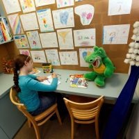 Children relax and play safely in our designated children’s area.